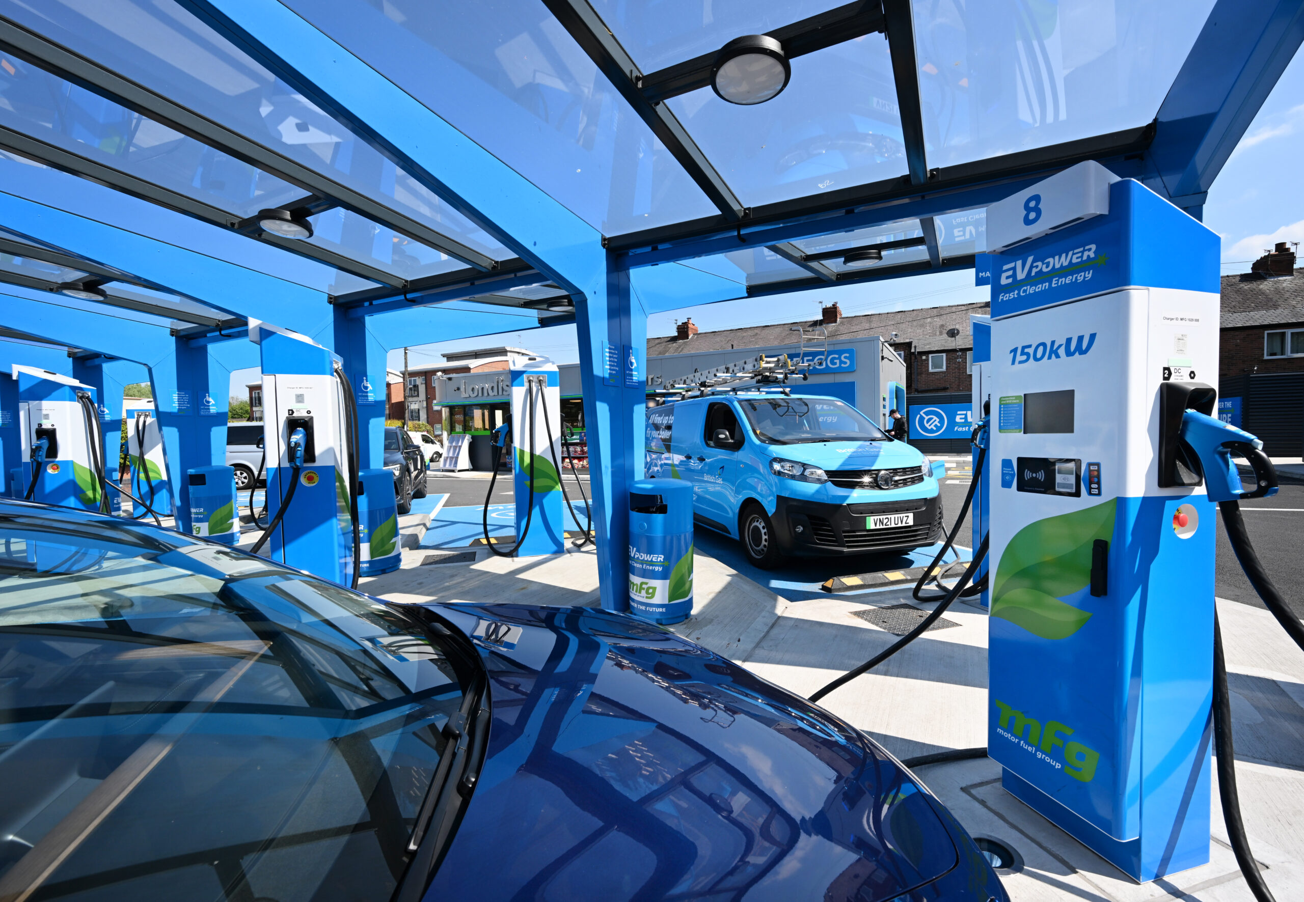 Bethell van charging at a fuel station forecourt
