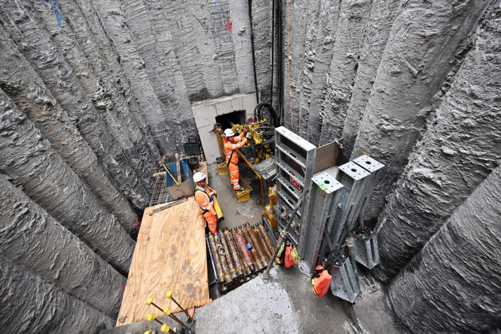 Operatives working in an underground chamber