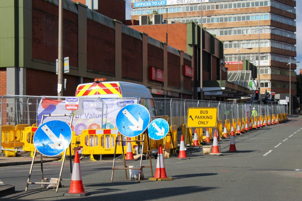 Operatives working within the highway in a town centre