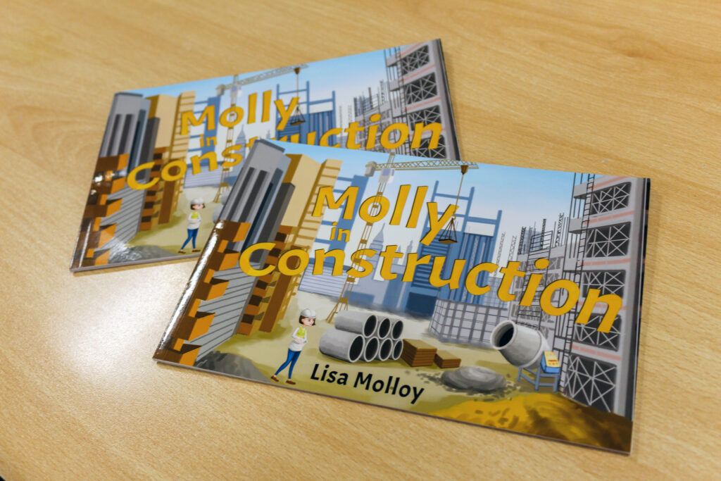 Two childrens books titled "Molly in Construction"